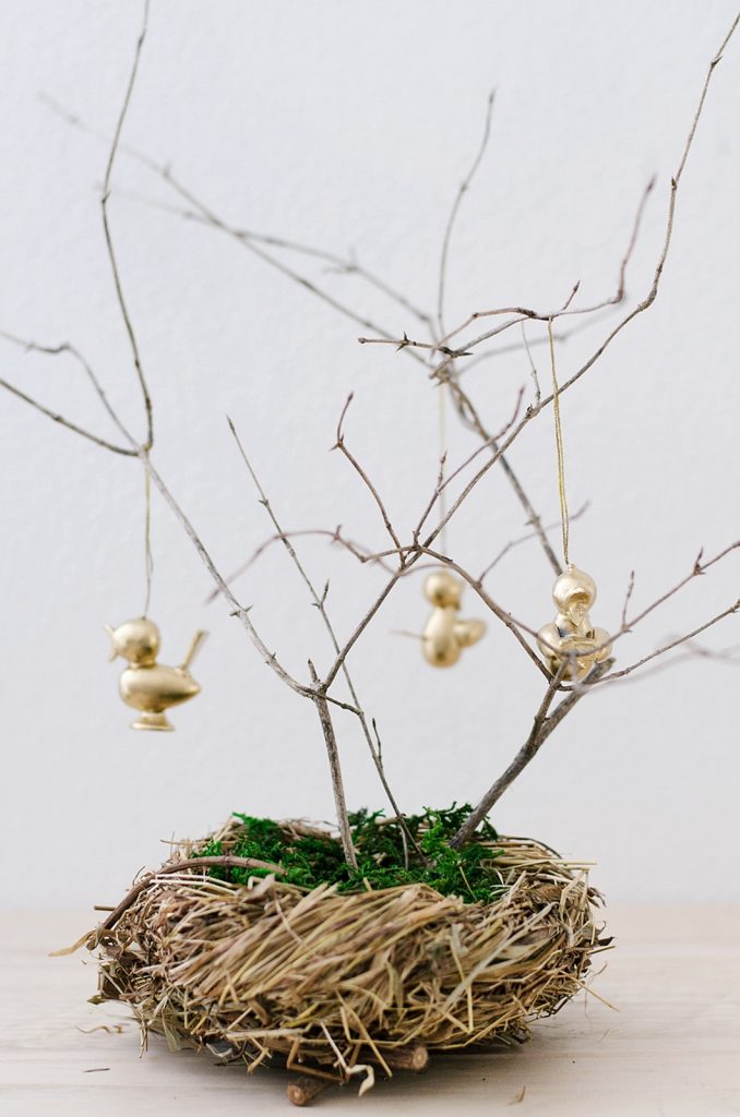 9 DIY Easter Decor Ideas for a Coastal Home - Easter Gold Chicks on Tree Branch #EasterDIY #EasterDecor #DIY #EasterCoastalDecor #EasterCoastalHome