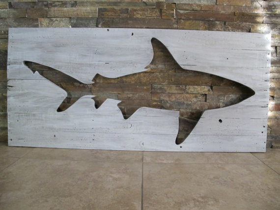 10 Cool Ways to Let Some Shark! Into Your Home - Shark Pallet Wall Art #sharkweek #shark #beachdecor #beachhouse #coastaldecor