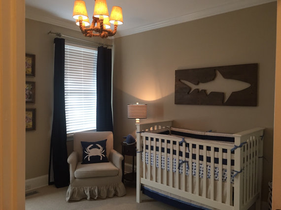 10 Cool Ways to Let Some Shark! Into Your Home - Shark Pallet Wall Art #sharkweek #shark #beachdecor #beachhouse #coastaldecor