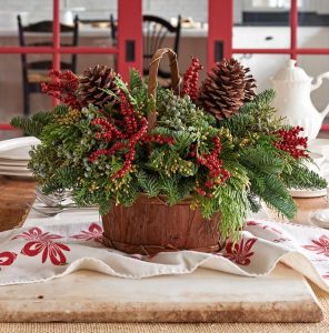 28 Christmas Centerpieces to Welcome House Guests Canella Berry Table Basket #Gifts #Centerpiece #ChristmasCenterpiece #Christmas #Decor #ChristmasEvergreens