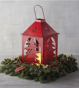 28 Christmas Centerpieces to Welcome House Guests Holiday Lantern With Tree Cutout #Gifts #Centerpiece #ChristmasCenterpiece #Christmas #Decor #ChristmasEvergreens