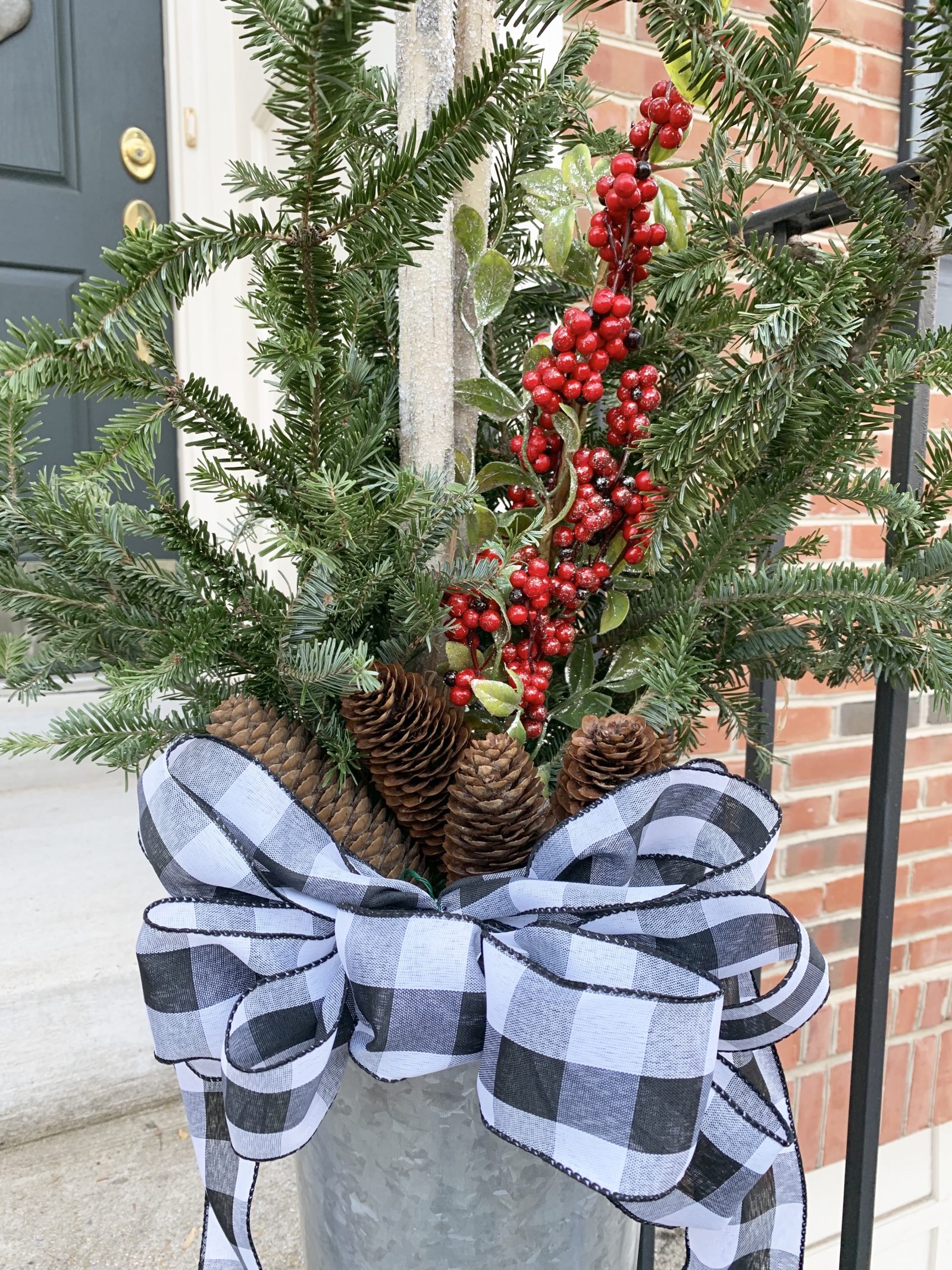 Modern Farmhouse Style DIY Christmas Door Decorations Christmas Birch Bucket #Farmhouse #Affordable #BudgetFriendly #Christmas #DIY #ChristmasDecor #FarmhouseDecor