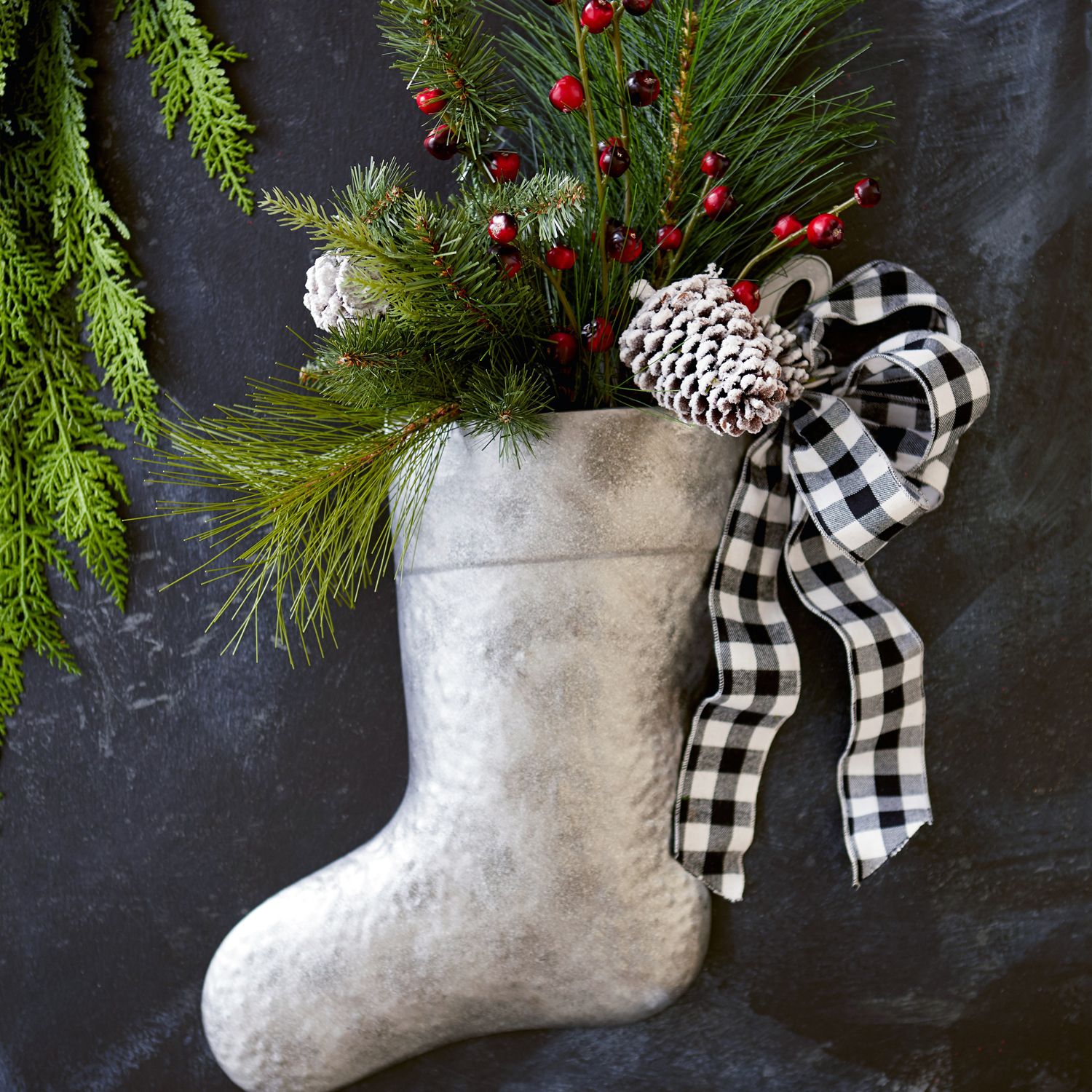 Modern Farmhouse Style DIY Christmas Door Decorations Galvanized Stocking Filled With Faux Greenery https://www.pier1.com/galvanized-stocking-%26-faux-greenery-door-hanger-%26-wreath-/3652349.html?cgid=wreaths-garlands#