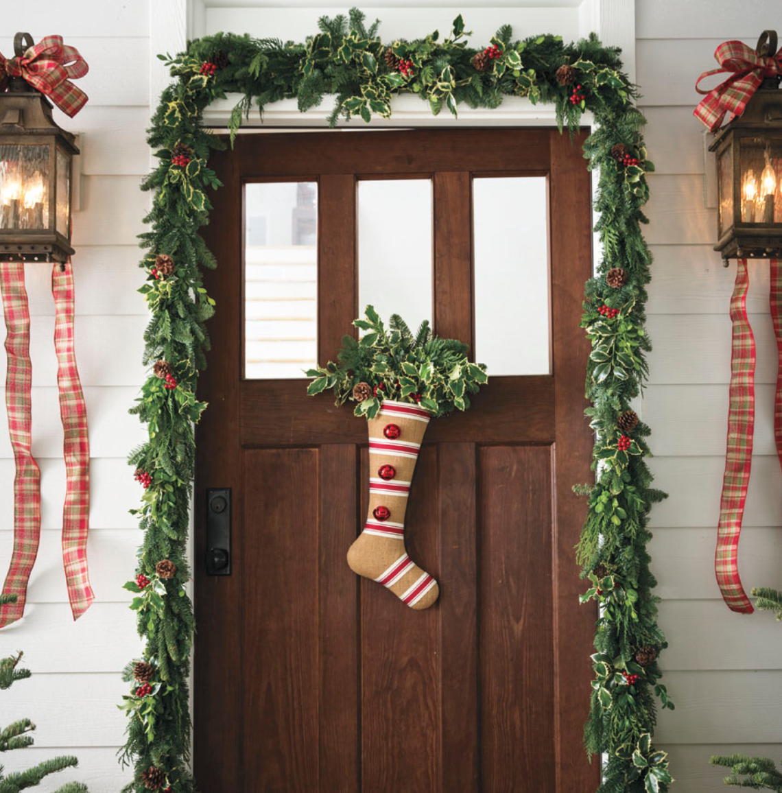 9 Christmas Front Door Decorations to Greet Your Holiday Guests Nostalgic Noble Fir Stocking Door #Christmas #ChristmasDecor #ChristmasStocking #ChristmasGatherings #FamilyGatherings #FrontDoorDecor #PorchDecor