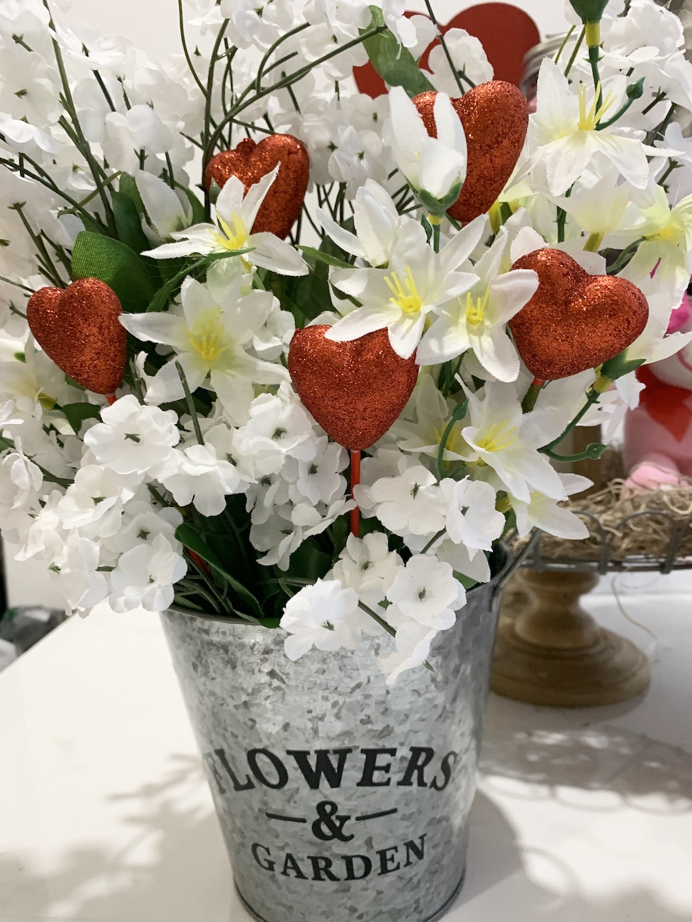 Valentine’s Day Home Decor Heart Floral Bucket #Farmhouse #Affordable #SimpleDecor #QuickAndEasy #BudgetFriendly #Valentine #ValentinesDay #DIY #StValentinesDecor #FarmhouseDecor