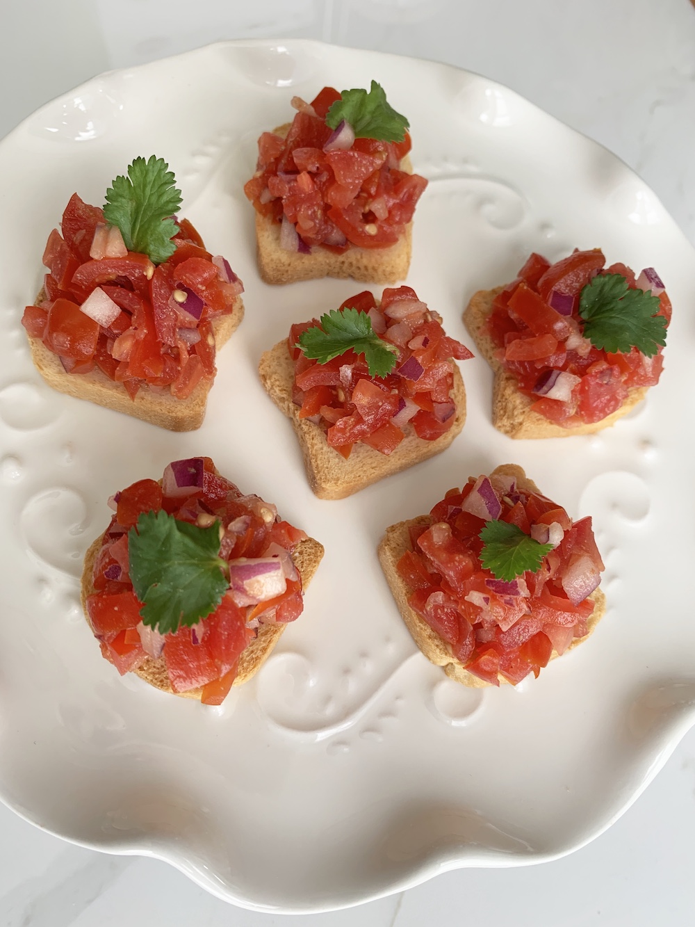 Grape Tomato Bruschetta, a Quick and Easy Appetizer Grape Tomato Bruschetta Fini #Bruschetta #GrapeTomatoes #TomatoBruschetta #QuickandEasy #BudgetFriendly #Affordable #Healthy #Appetizer #AffordableFood #SaveTime #SaveMoney