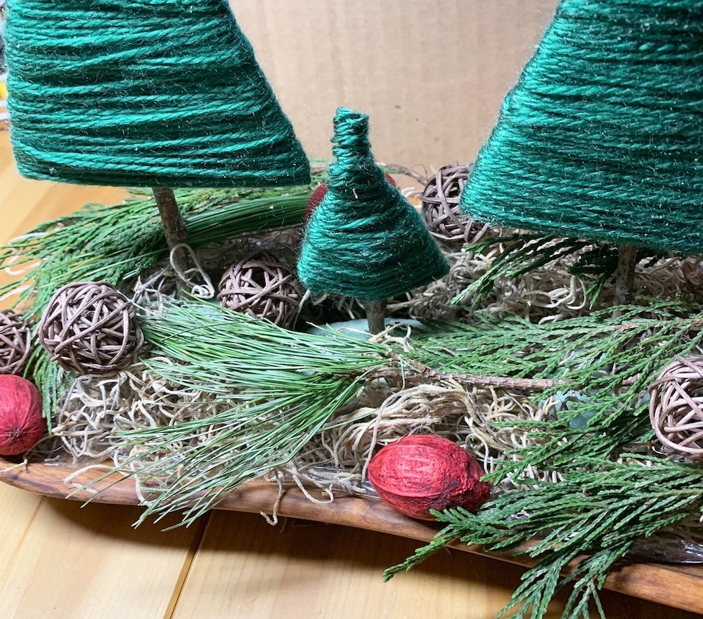 Affordable Home Decor Place Faux Red Pods and Brown Twig Balls #DIY #DIYChristmasCenterpiece #ChristmasDecor #ChristmasTableTop #DIYChristmasProject #RusticDecor #ChristmasCenterpiece