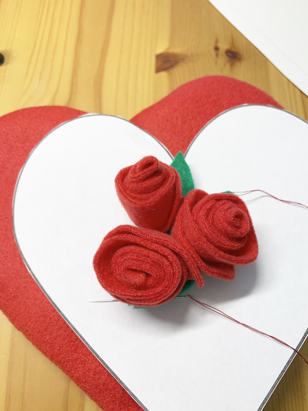 Make a Heart with Mini Rosettes Sew Three Rosettes Together #ValentinesDay #ValentineHeart #DIY #Decor #DIYDecor #DIYValentineDecor #ValentineHeartwithRosettes #HeartwithRosettes #DIYValentineHeart