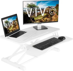 12 Best Home Office Upgrades - Vivo Height Adjustable Standing Desk Converter #HomeOffice #HomeOfficeDecor #WorkAtHome #WorkFromHome #HomeOfficeTools #HomeOfficeUpgrades #GirlBoss #GirlBossDecor #WorkAtHomeMom 