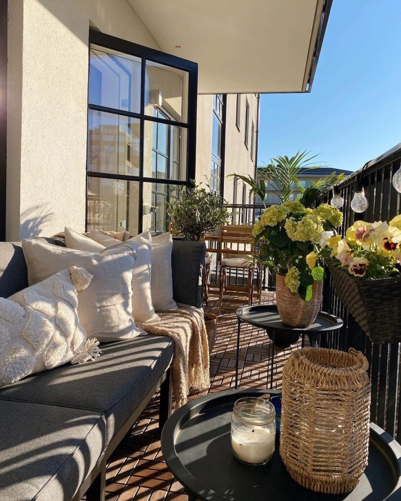 Lounge in the Morning Sun #Balcony #BalconyDecor #BalconyDecorIdeas #CoastalBalcony #HomeDecor #AtHomeontheBalcony #HomeDecorTips #BalconyHome 