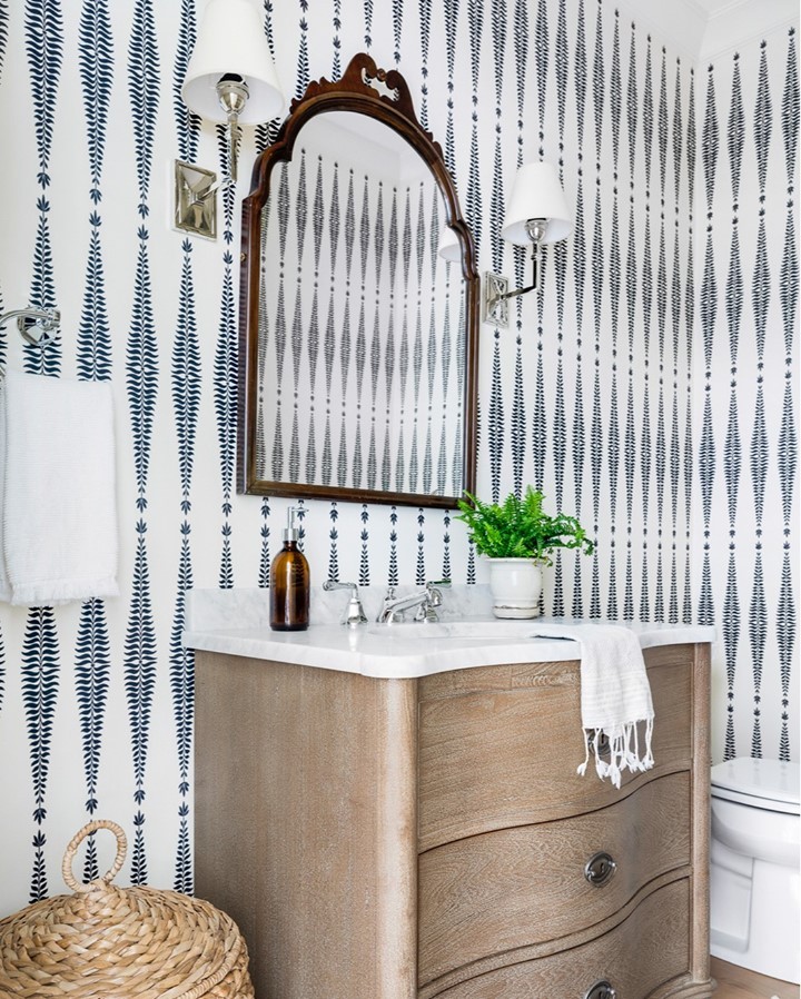 See the Kids Coastal Bathroom Update with Blue Palm Wallpaper